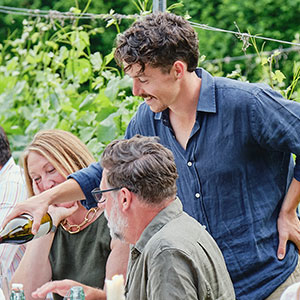 Angus pouring Wythall Estate Pinot Noir Reserve for guests 
