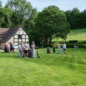 Gathering at Wythall Estate in the garden prior to Dining in the Vineyard in Herefordshire.
